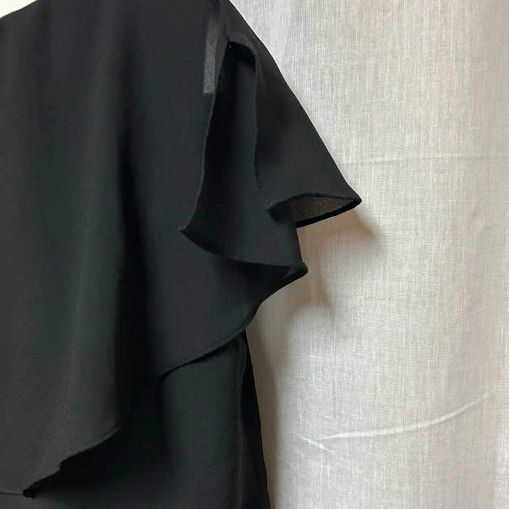Black tiered sassy dress 
Cruise 
Hem 40” 23” armpit to armpit flat 
Size 18 - Picture 12 of 13